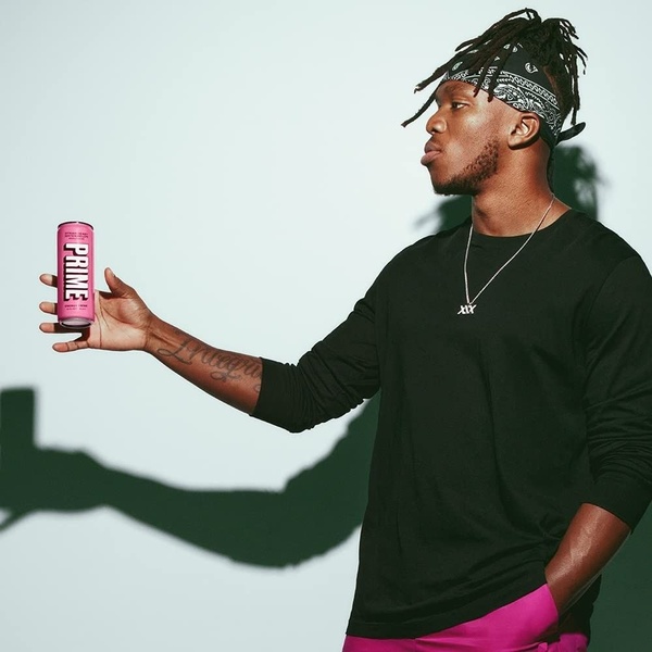 energy drink, canned energy drink, sports drink, performance drink, carbonated energy drink, energy beverage, brand awareness, product launch, lifestyle, editorial, energetic, bold, black, pink, green